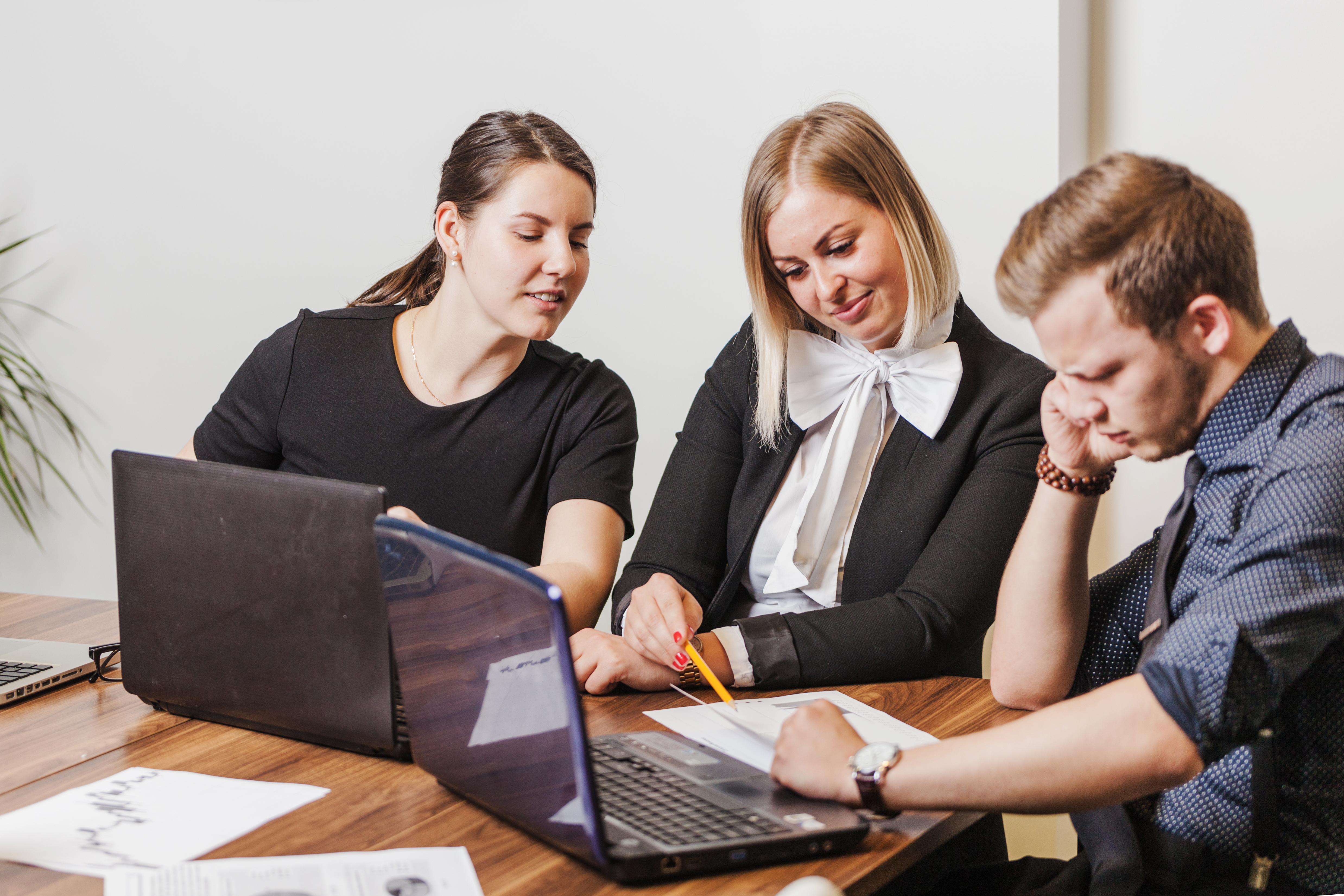 people-sitting-desk-talking