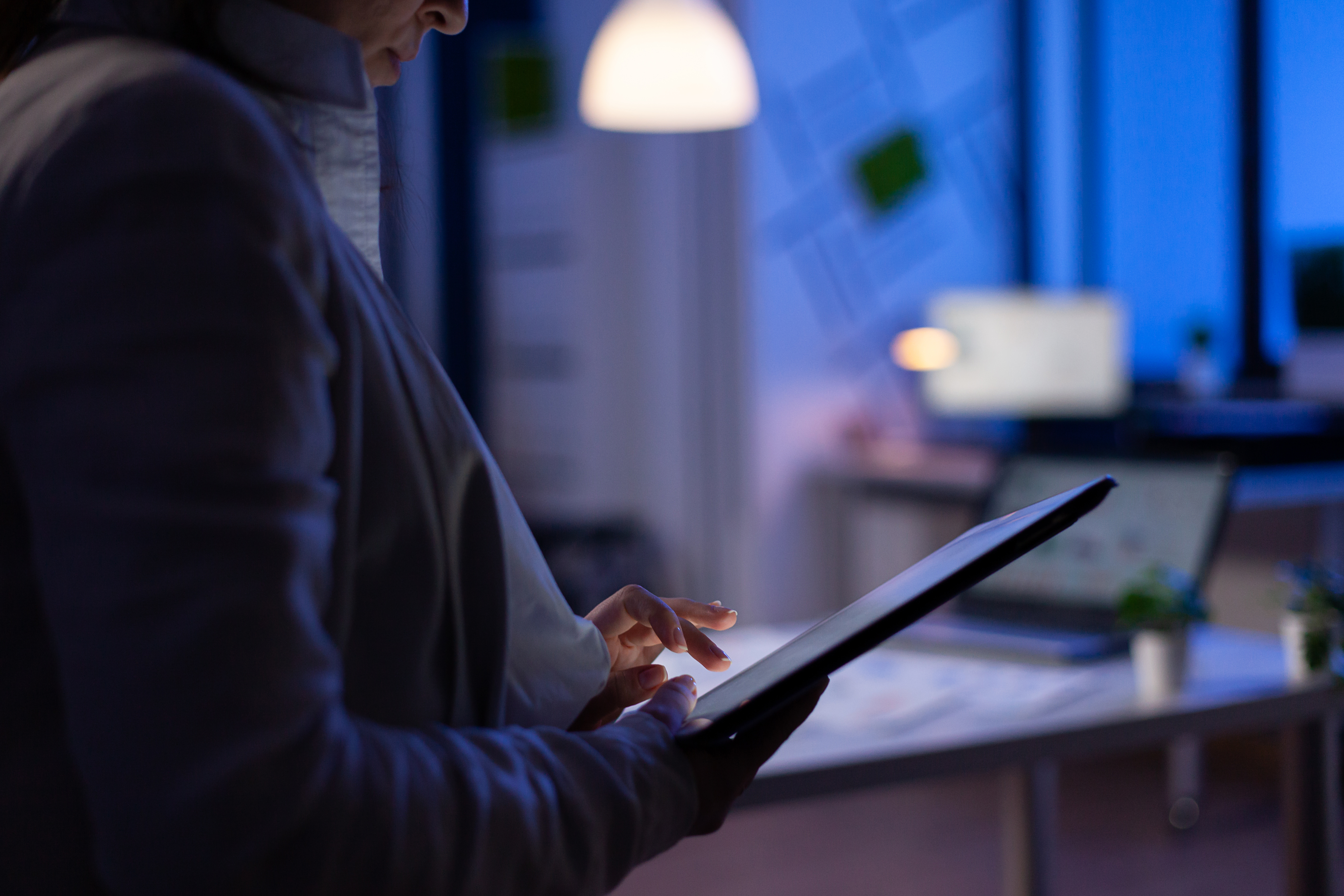 woman-hands-typing-tablet